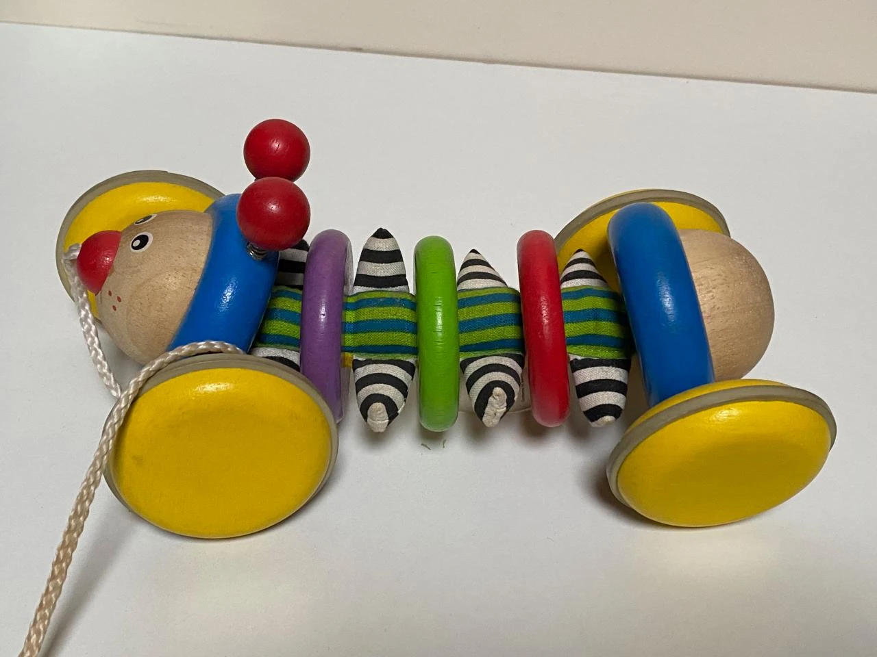 Wooden runner, caterpillar with fabrics – photo 2